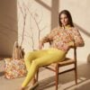 Skyler on the porch The Art Series (Red Garden) Track Jacket Yoga Leggings Canvas Deck Shoes Weekender Bag yellow red front art concierge clothing jpg