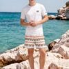 Booker Limestone Rocks Booker Limestone Rocks The Art Series (Mexican Triangles) Champion T-shirt Swim Trunks Canvas Deck Shoes multi-colored triangles white front art concierge clothing JPG